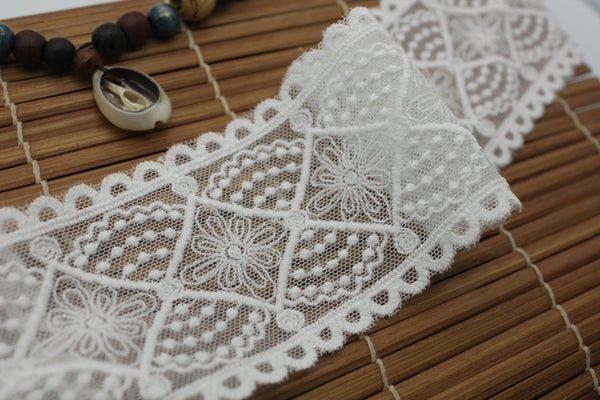 White cotton lace ribbon with diamond patterns and flower embroidered on mesh lace, 2 1/2 inches wide