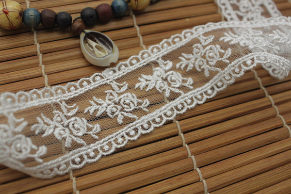 White cotton lace ribbon with flowers embroidered on mesh lace, 1 1/2 inches wide