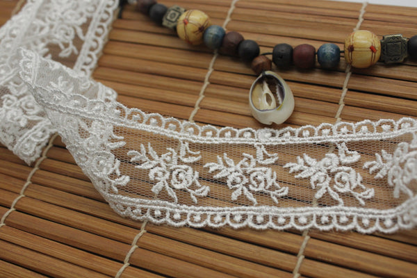 White cotton lace ribbon with flowers embroidered on mesh lace, 1 1/2 inches wide