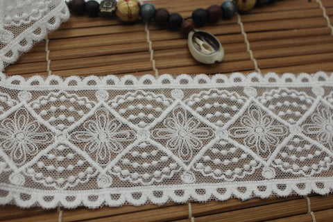 White cotton lace ribbon with diamond patterns and flower embroidered on mesh lace, 2 1/2 inches wide